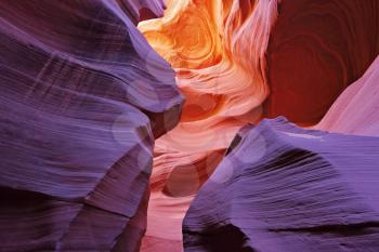 Glowing colorful underground corridor. Famous slot Antelope canyon  in the Navajo reservation. USA.