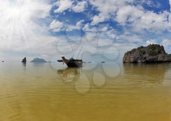 The famous Thai Longtail boat. Bay on oceanic islands. Thailand
