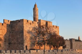 The walls of the eternal Jerusalem. Last rays of the sun gently illuminates the ancient walls and Tower of David