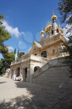 Church of Mary Magdalene in Jerusalem. Golden domes and creamy Jerusalem stone walls
