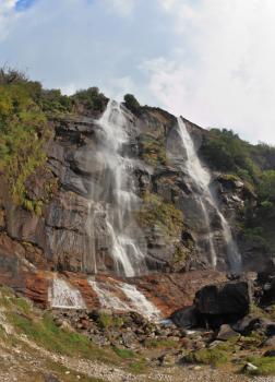 Twin Falls in the mountains of northern Italy. Hiking mountain trails are easy  to walk. Photo taken fisheye lens