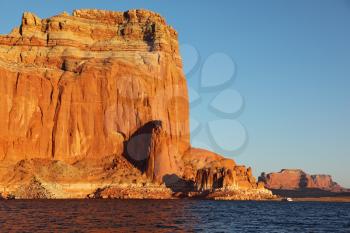Magnificent red sandstone cliffs on the shores of Lake Powell. Arizona, United States
