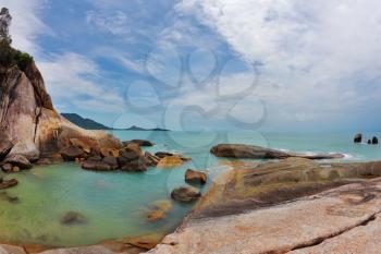 Picturesque coastal cliffs and azure sea. Koh Samui