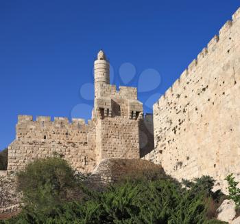 The Tower of David and ancient walls of the eternal Jerusalem. Beautiful sunset