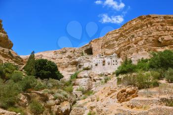 The famous Orthodox monastery of St. George. The building of the monastery was built on the wall of the gorge of Wadi Kelt. Israel