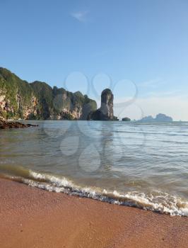 Peninsula Krabi coast in Thailand after the big flooding. Picturesque rocks on a beach