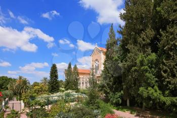  Israel.  The Trappist monastery - Latrun.  The magnificent building of the temple is surrounded by a lush garden