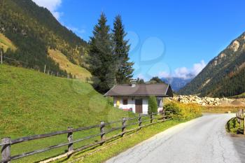 Early autumn in the Austrian Alps. The beautiful sunny day in the national park of the Grossglockner. The famous Alpine road Grossglocknershtrasse
