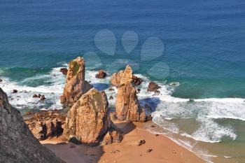 The picturesque, bizarre rocks on the shore of the Atlantic Ocean. Coast of Portugal, Cabo da Roca