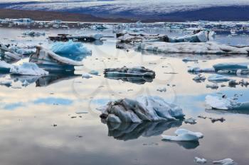 Icebergs and ice floes in the Ice Lagoon Jokulsarlon. South-east Iceland in July