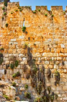 An ancient wall around of old quarters of Jerusalem