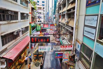 HONG KONG - DECEMBER 11, 2014: Hong Kong Special Administrative Region. Construction work on a narrow street in Hong Kong
