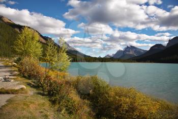 Footpath on coast of charming lake in Canada