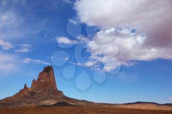 Monument Valley in the Navajo reservation in the USA. Rock of red sandstone in the Sunlight