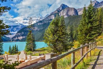  Low wooden fence on the shore of Lake Louise. Canada, Rocky Mountains, Alberta, Banff National Park