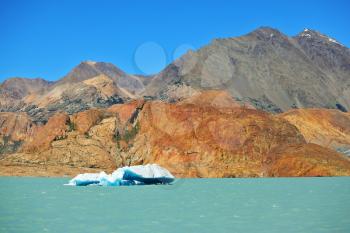 Unique lake Viedma in Argentine Patagonia. Excursion by boat on a cold lake waters to a huge iceberg.