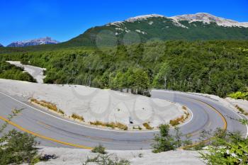 Winding road in Chilean Patagonia, covered volcanic ash