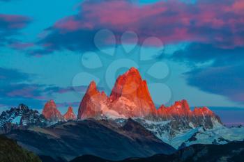  Amazing Patagonia in February. Sharp tops fantastically beautiful cliffs Fitz Roy crimson light rays of sunset