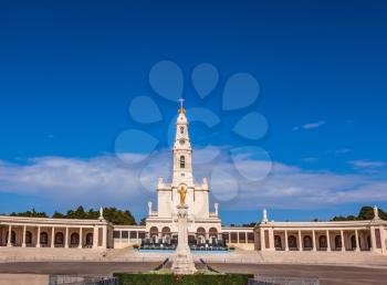 The magnificent cathedral complex with colonnade and large area in front of them. Portugal. City Fatima - Catholic pilgrimage center