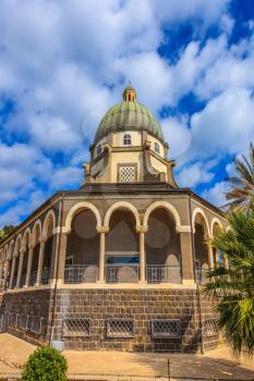The Middle East, the Sea of Galilee. Basilica of the monastery of Mount Beatitudes. The magnificent dome surrounded by a gallery with columns
