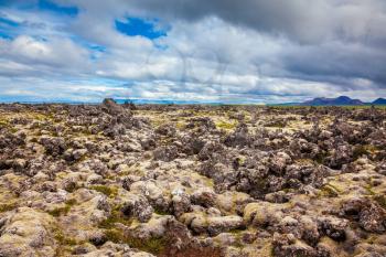  Lava fields in central part of the island. Cloud Iceland in the summer