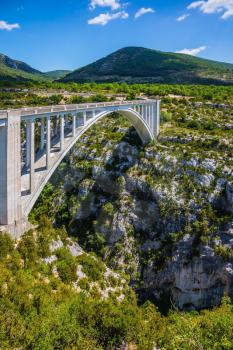 The white bridge over tributary of the River Verdon Artuby, from which arranged jumping. The largest alpine canyon Verdon. Canyon of Verdon, Provence, France