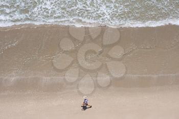 Man walking at the beach