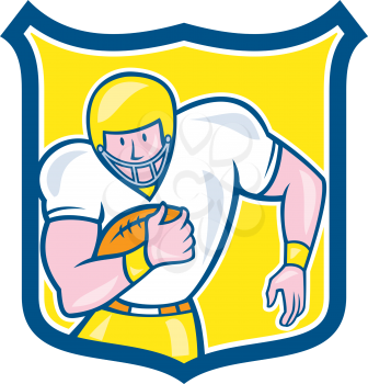 Illustration of an american football gridiron player fullback holding ball viewed from front set inside shield on isolated background done in cartoon style.