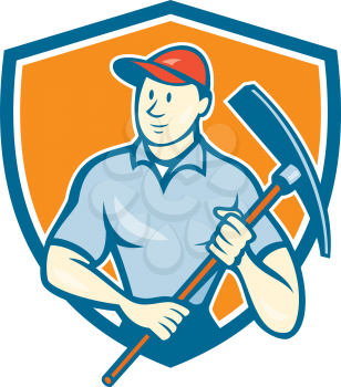 Illustration of a construction worker wearing hat holding pickaxe set inside shield crest on isolated background done in cartoon style. 