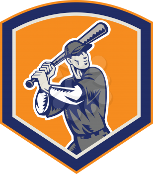 Illustration of a american baseball player batter hitter batting set inside shield shape done in retro woodcut style isolated on background.