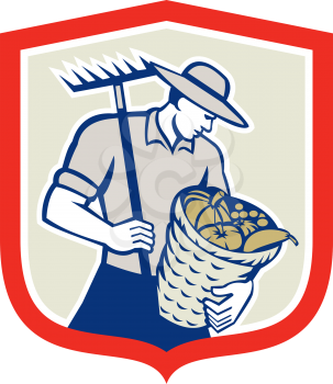 Illustration of organic farmer with rake and basket of harvest crop of vegetables facing side set inside shield crest done in retro style.