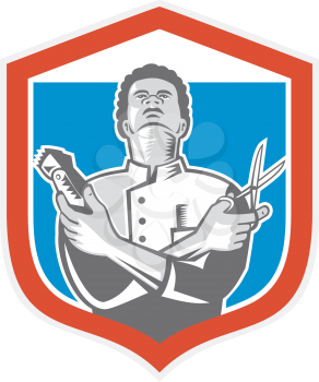 Illustration of an african-american barber holding a hair clipper and scissors facing front looking up set inside shield crest done in retro style on isolated background.