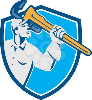 Illustration of a plumber wielding monkey wrench looking up viewed from the side set inside shield crest on isolated background done in retro style. 