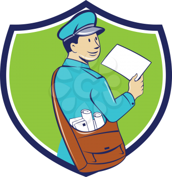 Illustration of a mailman postman delivering a letter looking to the side viewed from rear set inside shield crest on isolated background done in cartoon style. 