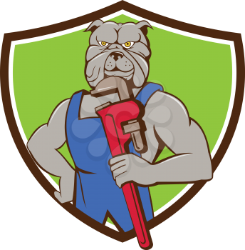 Illustration of a bulldog plumber holding monkey wrench with hand on hips viewed from front set inside shield crest done in cartoon style.