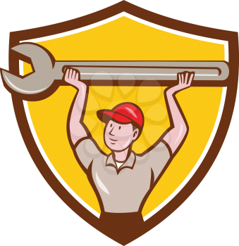 Illustration of a mechanic lifting giant wrench over head looking to the side viewed from front set inside shield crest on isolated background done in cartoon style. 