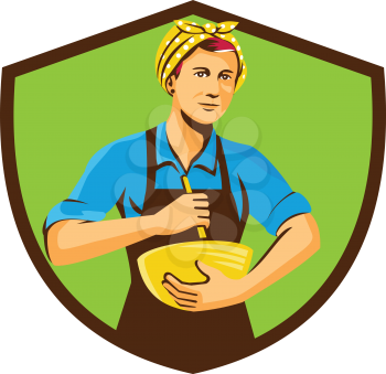 Illustration of a female chef with bandana holding spatula and mixing bowl mixing viewed from the front set inside shield crest on isolated background done in retro style. 