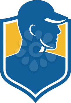 Icon style illustration of an Industrial Worker wearing hat set inside shield Crest on isolated background.