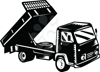 Retro woodcut black and white style illustration of a dump truck, known also as a dumper truck or tipper truck viewed from a high angle on side in isolated white background.
