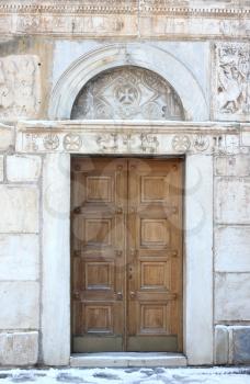 Royalty Free Photo of the Antique Door of St. Eleftherios Orthodox Church in Athens, Greece