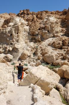 Royalty Free Photo of a Person at the Ein Gedi Nature Reserve off the Coast of the Dead Sea.