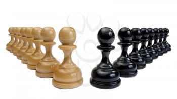 Several wooden chess pieces light and dark colors.