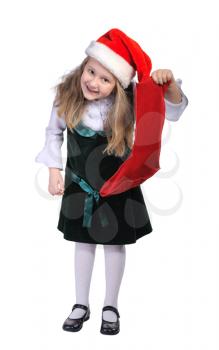 Royalty Free Photo of a Little Girl Holding a Stocking and Wearing a Santa Hat