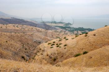 Shore of Lake Kinneret, the slopes of the Golan Heights in Israel