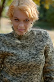 Beautiful girl in a park alone