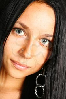 Close Up Portrait of a Dark Brunette Woman with Beautiful Eyes and Nose Ring