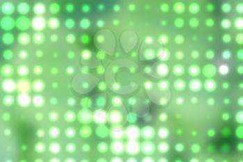 Background with out of focus light dots in green