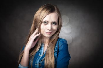 young blonde wearing jeans jacket torso shot