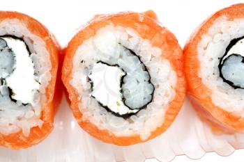 sushi with salmon and avocado closeup