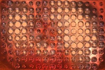 copper metal background cowered with dots